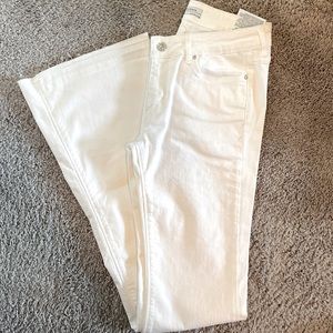 Zara White Flare jeans with raw hem.